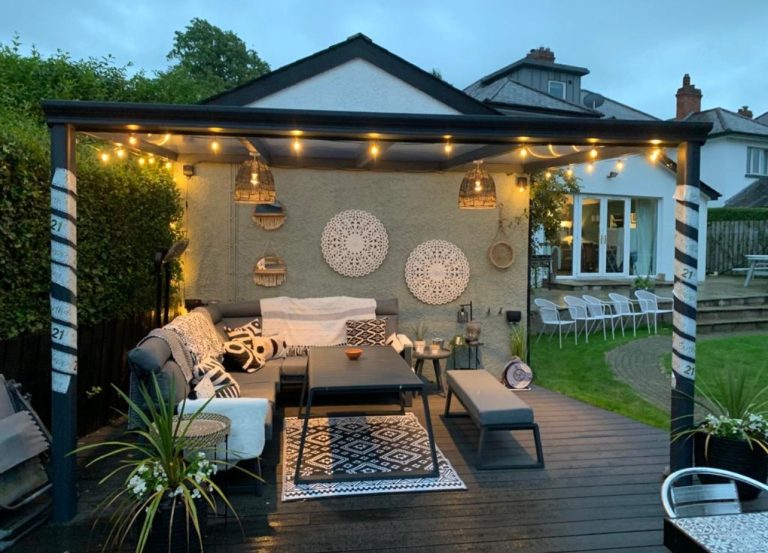 Bosco veranda with festoon lights over a seating area
