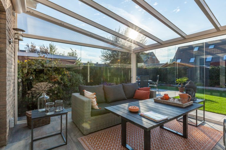 Seating area under a Pigato glass roof