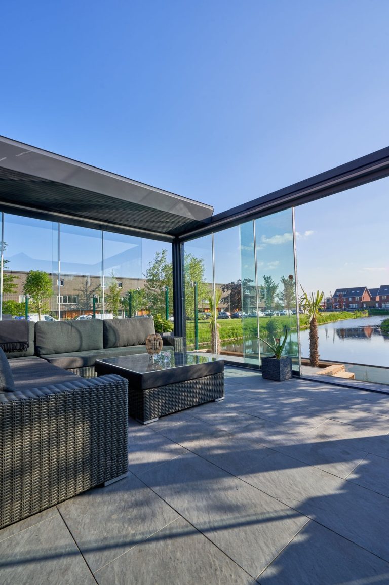 Lounge furniture under a Pinela Retractable roof
