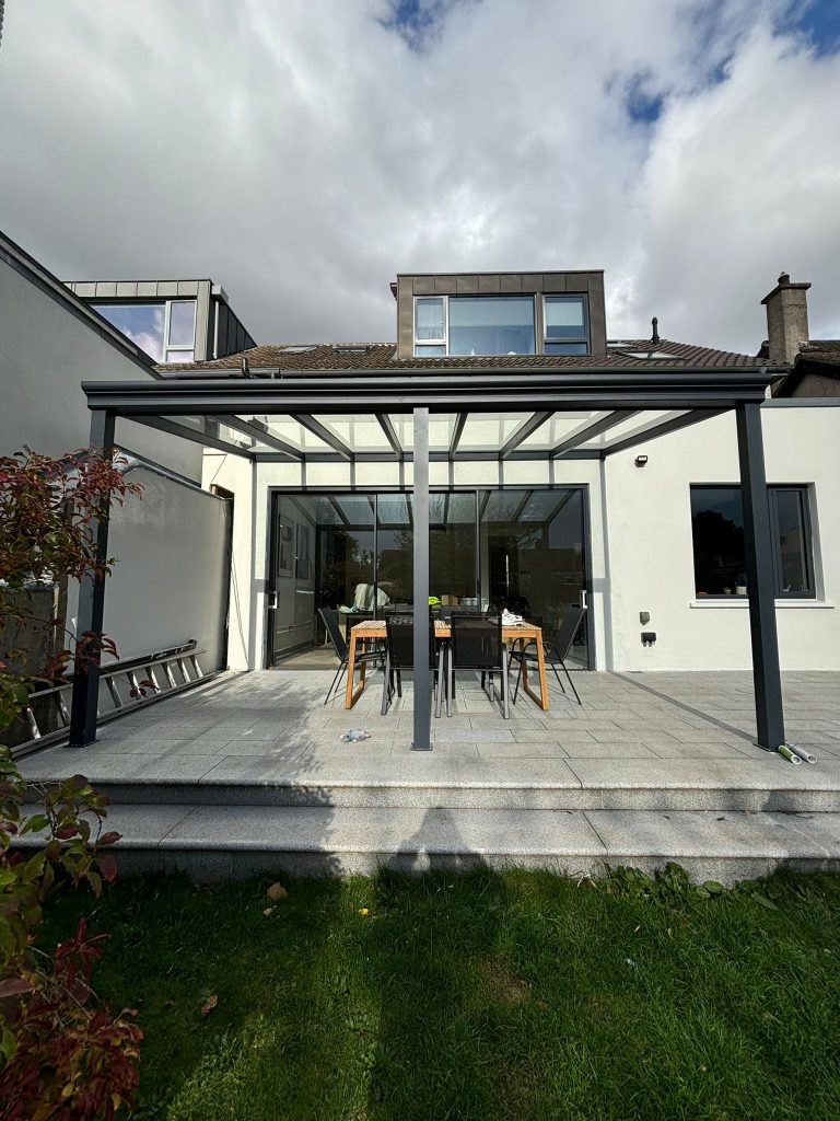Pigato glass-roof veranda at the back of a house